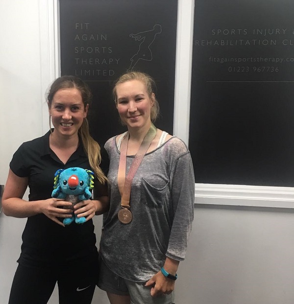 Hayley Simmonds in clinic with her medal